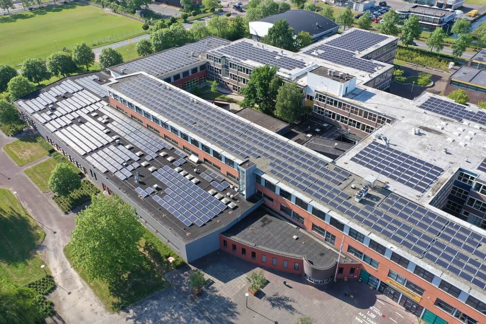 solar panel grid on a school rooftop