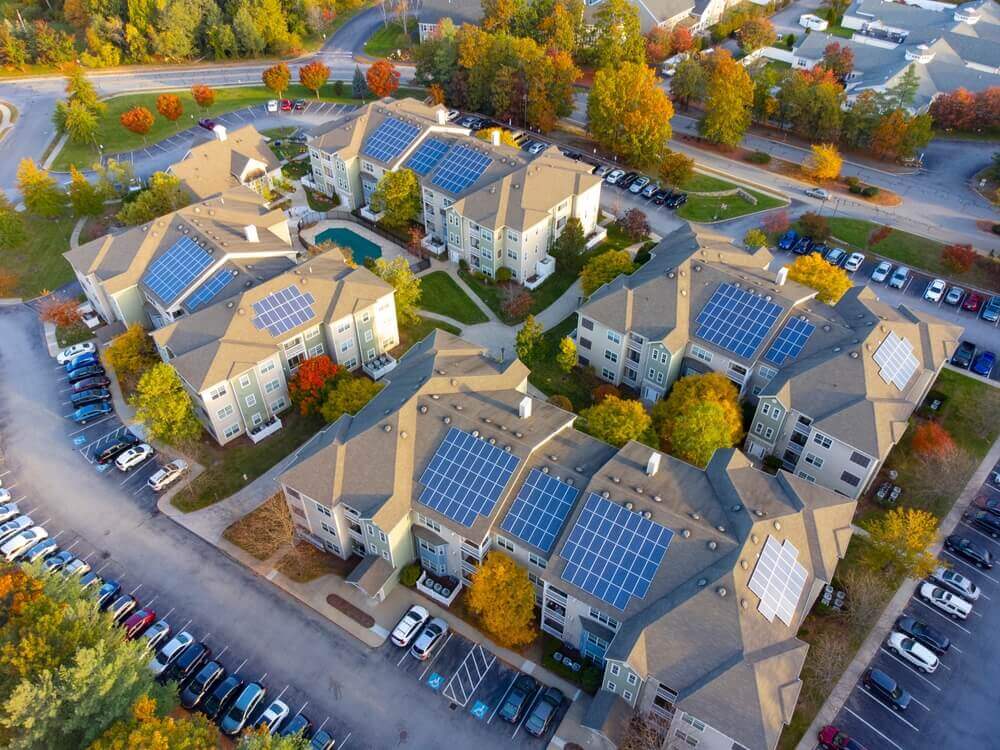 solar panels on roofs of apartment buildings