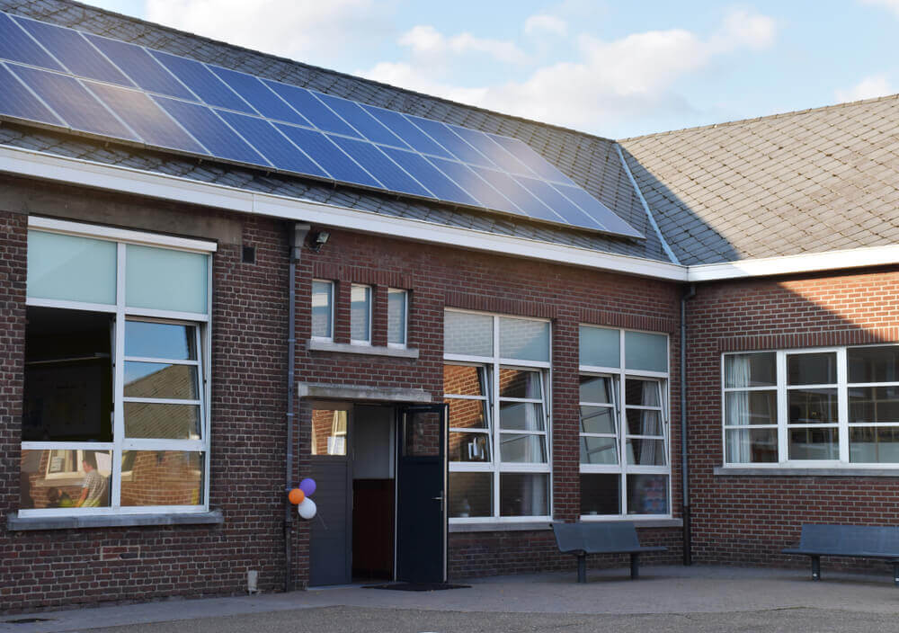 Kindergarten school with solar panel rooftops