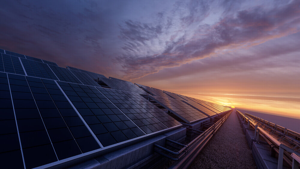 setting sun with a solar farm grid system
